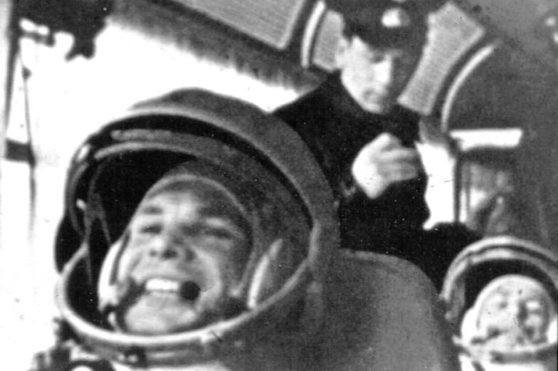 Gagarin and his back-up Titov aboard the transfer bus.