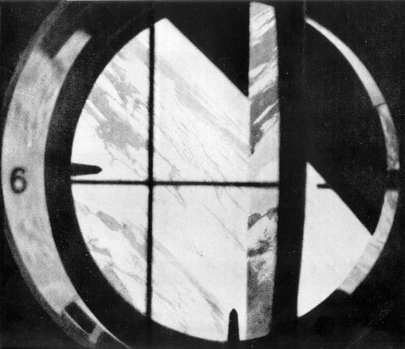 Grainy black and white image of the curvature of the Earth through the porthole of Vostok