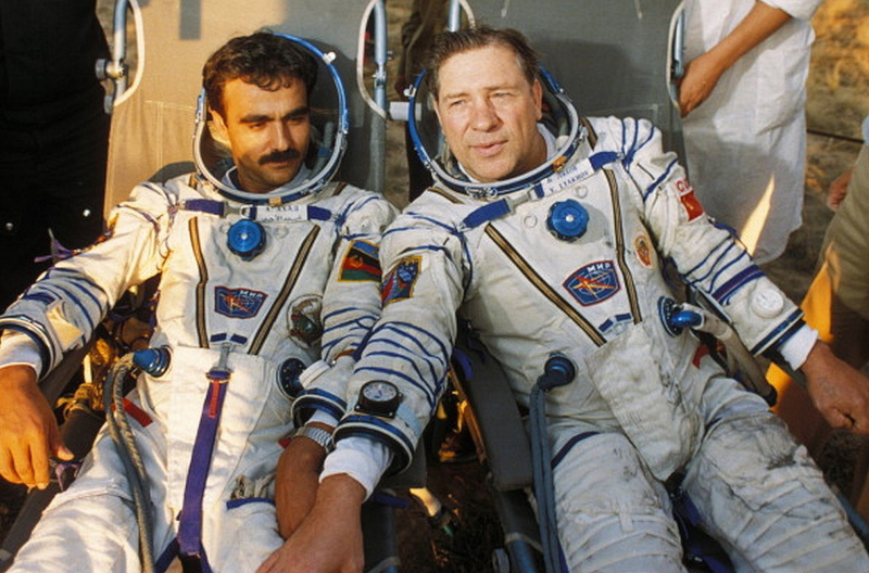 Mohmand and Lyakhov are seen safely back on the ground after a difficult landing in Soyuz TM-5