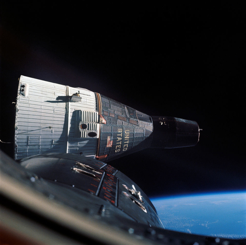 orbital view of the Gemini 7 spacecraft, taken from the nearby Gemini 6 during rendezvous on 15 December 1965.