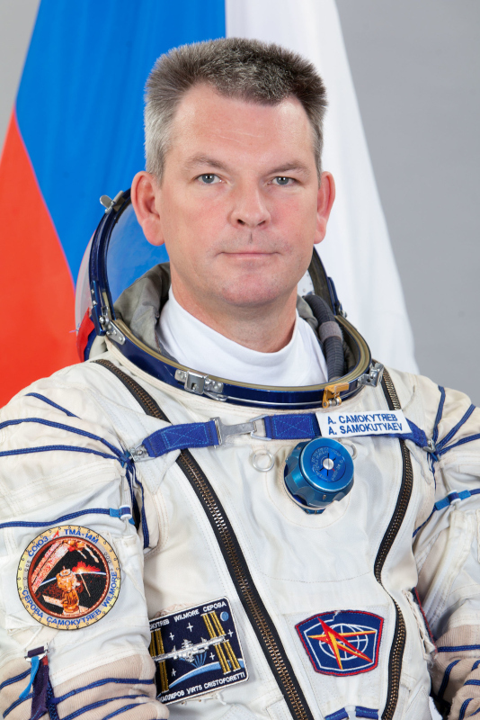 portrait of Russian cosmonaut Aleksandr Samokutyaev in a Sokol spacesuit