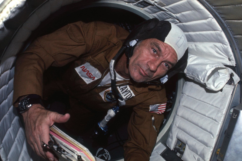 Slayton is seen floating through the docking module heading into the Soyuz spacecraft during ASTP in 1975.